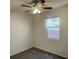 Cozy bedroom with carpet flooring, a ceiling fan, and natural light at 740 White Grotto St, Las Vegas, NV 89138