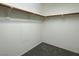 Spacious walk-in closet with shelving, racks and new gray carpet at 740 White Grotto St, Las Vegas, NV 89138