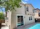 Two-story home with a pristine pool, blending indoor and outdoor living seamlessly at 740 White Grotto St, Las Vegas, NV 89138