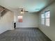 Bright and airy living room with a fireplace, carpet flooring, and natural lighting at 740 White Grotto St, Las Vegas, NV 89138