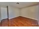 Spacious bedroom with hardwood floors, neutral paint, and ample natural light for a relaxing retreat at 7614 Isley Ave, Las Vegas, NV 89147