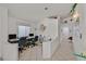 Bright office space with dual workstations, built-in shelving, and tile floors at 7645 Falconwing Ave, Las Vegas, NV 89131