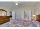 Bedroom boasts neutral walls and carpet, along with a large window that provides ample lighting at 7649 Broadwing Dr, North Las Vegas, NV 89084