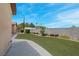 Manicured backyard with large artificial turf at 7668 Friendly Breeze Ct, Las Vegas, NV 89123