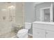 This bathroom has a walk-in glass shower and a modern white vanity at 7668 Friendly Breeze Ct, Las Vegas, NV 89123
