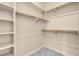 Organized walk-in closet with shelves and rods for ample storage, ready for your wardrobe at 7668 Friendly Breeze Ct, Las Vegas, NV 89123