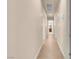 Hallway with arched entryway and tile flooring at 7668 Friendly Breeze Ct, Las Vegas, NV 89123