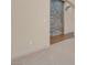Hallway showing stone accent wall transitioning to carpeted room at 7668 Friendly Breeze Ct, Las Vegas, NV 89123