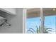 The laundry room offers a window and ample storage at 7668 Friendly Breeze Ct, Las Vegas, NV 89123