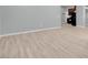 The living room features modern flooring, neutral paint, and an open floor plan at 7668 Friendly Breeze Ct, Las Vegas, NV 89123