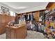Spacious walk-in closet with custom wood shelving, drawers, and a central island for organization at 807 Canyon Greens Dr, Las Vegas, NV 89144