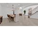 Open dining room area features recessed lighting, a large table, and a neutral color palette at 807 Canyon Greens Dr, Las Vegas, NV 89144