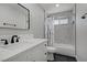 Bathroom features a modern vanity and a shower/bathtub combo with tile surround at 823 Cherry Dr, Henderson, NV 89002