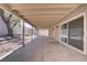 Spacious covered patio extends the living space outdoors and features desert landscaping at 823 Cherry Dr, Henderson, NV 89002