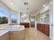 Spacious bathroom featuring a large soaking tub, dual vanities, and a separate glass shower at 9319 Bronze River Ave, Las Vegas, NV 89149