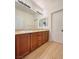 Well-lit bathroom features double sinks and ample counter space at 9319 Bronze River Ave, Las Vegas, NV 89149