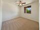 Bedroom with neutral carpet and natural light at 9319 Bronze River Ave, Las Vegas, NV 89149