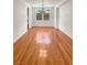 Bright dining room with hardwood floors and a modern chandelier at 9319 Bronze River Ave, Las Vegas, NV 89149
