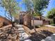 Charming home with manicured landscaping and a welcoming walkway leading to the entrance at 9319 Bronze River Ave, Las Vegas, NV 89149