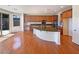 Large kitchen features an oversized island, stainless appliances and lots of cabinet space at 9319 Bronze River Ave, Las Vegas, NV 89149