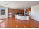 Gourmet kitchen boasts custom cabinets, granite countertops, and stainless steel appliances at 9319 Bronze River Ave, Las Vegas, NV 89149