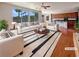 Comfortable living area with hardwood floors, bright windows, and stylish decor, perfect for relaxation at 9319 Bronze River Ave, Las Vegas, NV 89149
