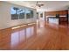 Spacious living area features hardwood floors and large windows for ample natural light at 9319 Bronze River Ave, Las Vegas, NV 89149