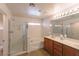 Bright bathroom showcasing a shower, tub, and double vanity at 9629 Toy Soldier St, Las Vegas, NV 89178