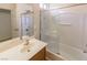 Bathroom featuring a shower-tub combo, a single sink vanity, and a mirrored medicine cabinet at 9629 Toy Soldier St, Las Vegas, NV 89178