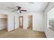 Bright bedroom with natural light, carpet flooring, and ceiling fan at 9629 Toy Soldier St, Las Vegas, NV 89178