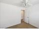 Bedroom featuring white walls, carpet, a ceiling fan, and a view into the hall at 9629 Toy Soldier St, Las Vegas, NV 89178
