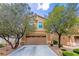 Charming two-story home featuring a two car garage and mature trees at 9629 Toy Soldier St, Las Vegas, NV 89178