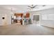 Bright kitchen open to living space with breakfast bar and stainless steel appliances at 9629 Toy Soldier St, Las Vegas, NV 89178