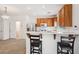 Open-concept kitchen featuring breakfast bar, stainless appliances, and lots of cabinets at 9629 Toy Soldier St, Las Vegas, NV 89178
