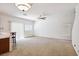 Spacious living area with plush carpeting and sliding glass doors for ample light at 9629 Toy Soldier St, Las Vegas, NV 89178