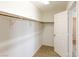 Walk-in closet featuring hanging rods and shelving for organization at 9629 Toy Soldier St, Las Vegas, NV 89178