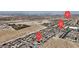 This aerial view shows the home's location within a community of similar two-story homes at 9917 Fletcher Peak Ave, Las Vegas, NV 89178