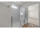 Beautiful bathroom featuring a glass shower and a view of the bedroom at 9917 Fletcher Peak Ave, Las Vegas, NV 89178
