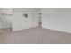 Bright bedroom featuring carpeted floors and access to the closet and bathroom at 9917 Fletcher Peak Ave, Las Vegas, NV 89178