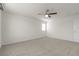 Bedroom featuring large windows, light gray carpet and neutral walls at 9917 Fletcher Peak Ave, Las Vegas, NV 89178