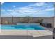 Backyard with a stunning pool, perfect for relaxation and entertainment at 9917 Fletcher Peak Ave, Las Vegas, NV 89178