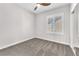 Bedroom featuring a window, carpet floors, a ceiling fan, and a closet at 10345 Howling Coyote Ave, Las Vegas, NV 89135