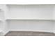 Spacious walk-in closet with ample shelving and hanging space, perfect for storage at 10345 Howling Coyote Ave, Las Vegas, NV 89135