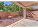 Private backyard patio provides a tranquil outdoor space with low-maintenance landscaping and fresh air at 10345 Howling Coyote Ave, Las Vegas, NV 89135
