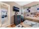 A charming bedroom with a playful design, featuring a dresser, decor, and a comfortable bed at 10701 Windrose Point Ave, Las Vegas, NV 89144