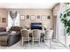 A cozy dining area with an elegant table and chairs, perfect for Gathering meals at 10701 Windrose Point Ave, Las Vegas, NV 89144