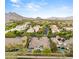 Sprawling community surrounded by picturesque mountains showcases the neighborhood's serene setting at 10717 Beringer Dr, Las Vegas, NV 89144