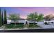 Charming single-story home with manicured lawn, mature trees, and a three-car garage at 10717 Beringer Dr, Las Vegas, NV 89144
