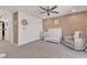 Cozy Bedroom features a geometric accent wall, ceiling fan, and closet for storage at 10729 Marathon Bell Ln, Las Vegas, NV 89129