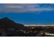 Enjoy stunning Vegas city views from this home, nestled against the mountains at 10729 Marathon Bell Ln, Las Vegas, NV 89129